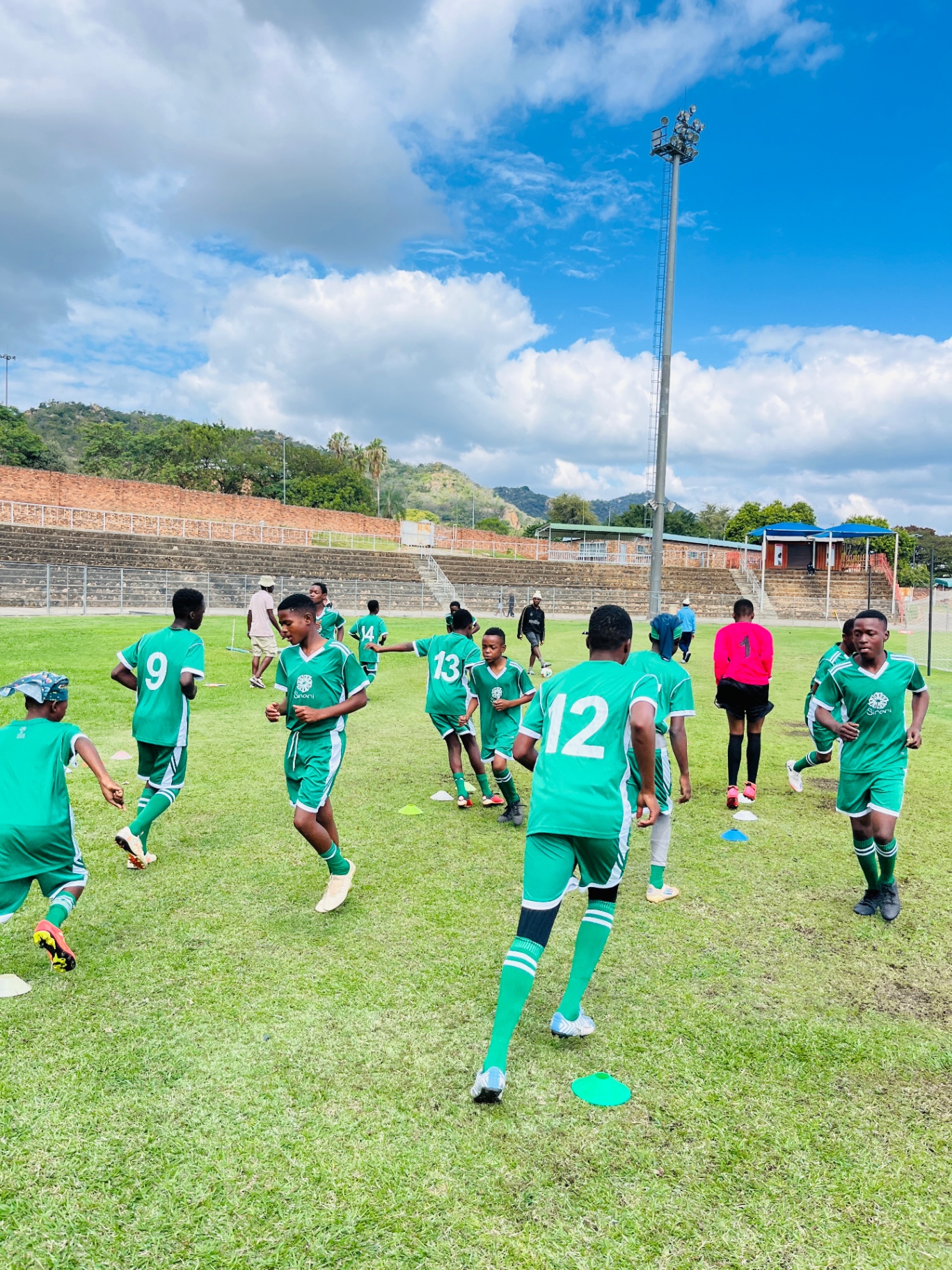 Players in a training warm-up session
